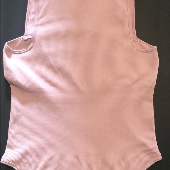 Pink, Green, and Tan Ribbed Bodysuits - Picture 2 of 5